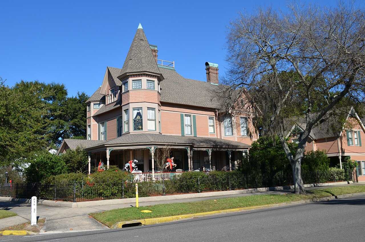 An older Victorian frame house with a porch